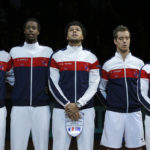 French team posings the national anthem prior to their Davis Cup world group first round tennis match against Australia in France
